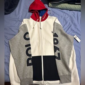 Brand new Ralph Lauren zip up hoodie.
